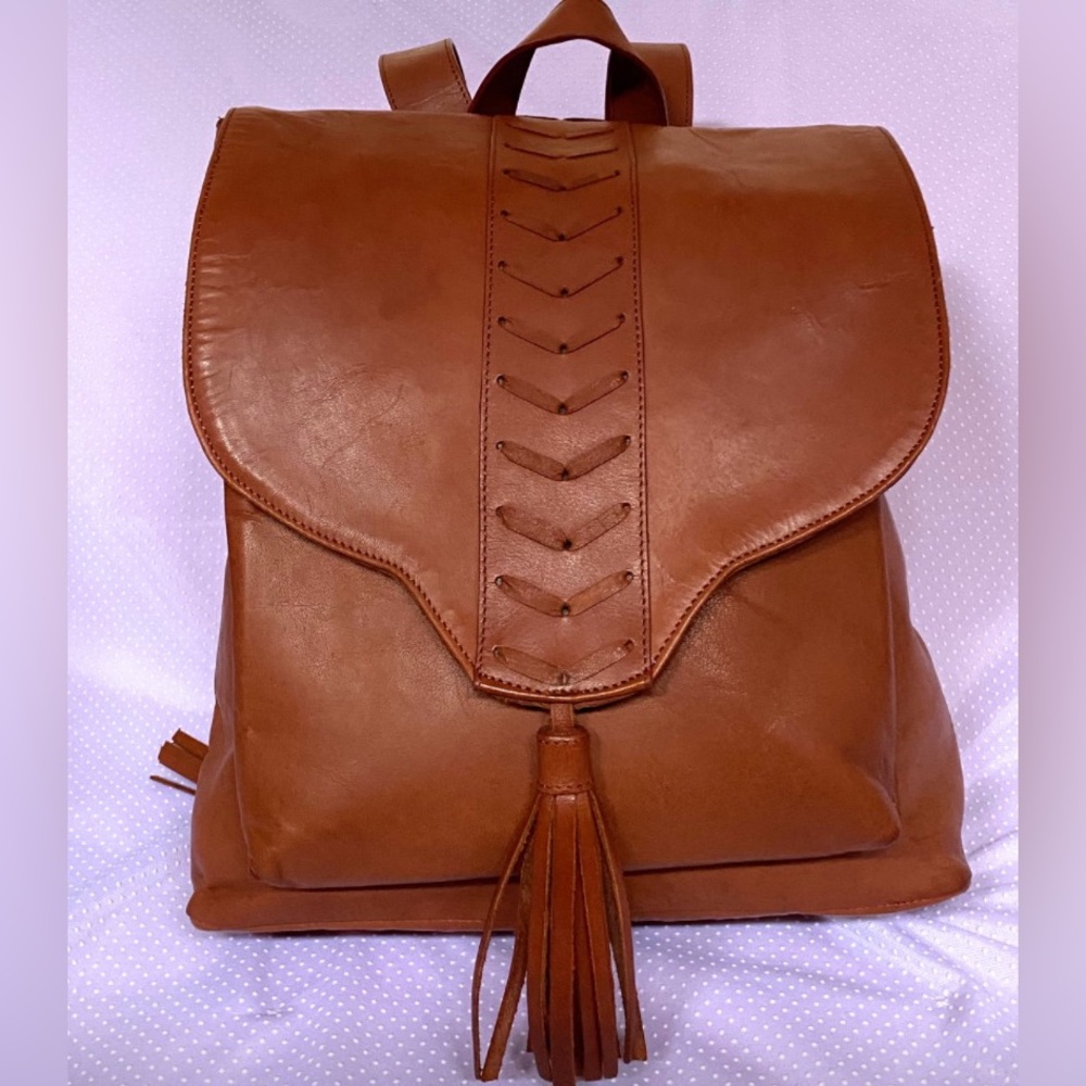Undercover hippie leather whiskey backpack